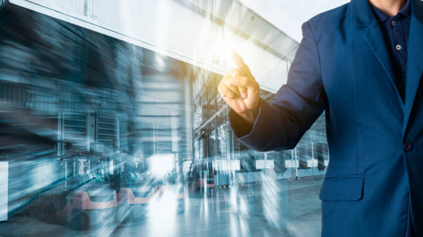 istock Businessman manager touching for workers with Modern Trade warehouse logistics. 1052795366