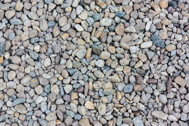 istock Natural colorful pebble (stones) background texture with copy space. 1052822456