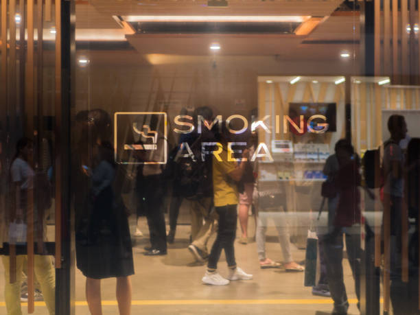 A modern smoking area near Shinjuku station in Tokyo, Japan. stock photo
