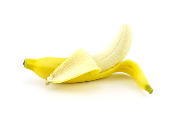 istock Peeled ripe banana isolated on white background 1052835348
