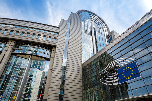 Brussels, Belgium-August 25, 2015- European Parliament modern building with EU logo in Belgian capital.