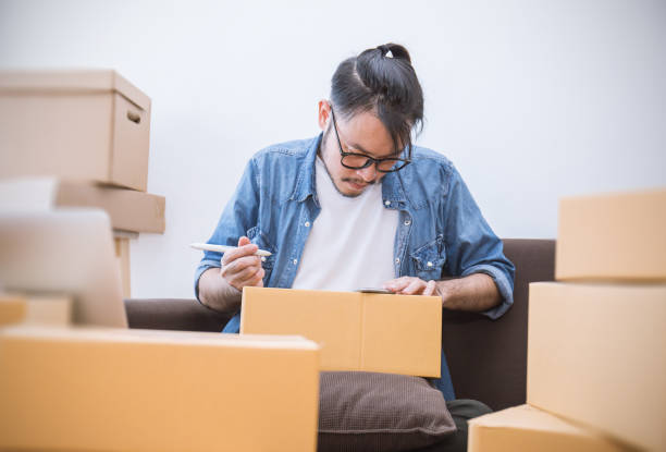 istock Start up small business entrepreneur or freelance man working at home concept 1052876462