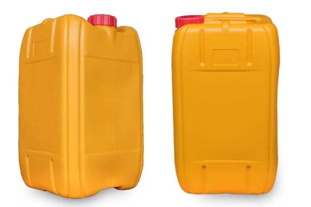 istock Yellow gallon of oil isolated  on white background with path. 1052877500