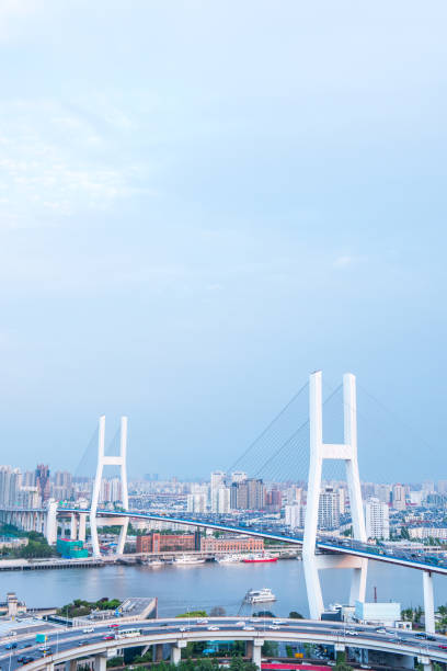 istock The city highway bridge on the river. 1052879318