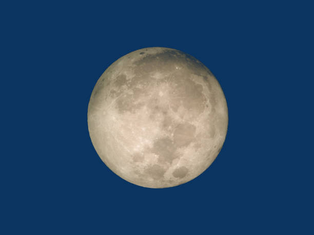 istock Full moon at dawn. Full moon before sunrise 1052881852