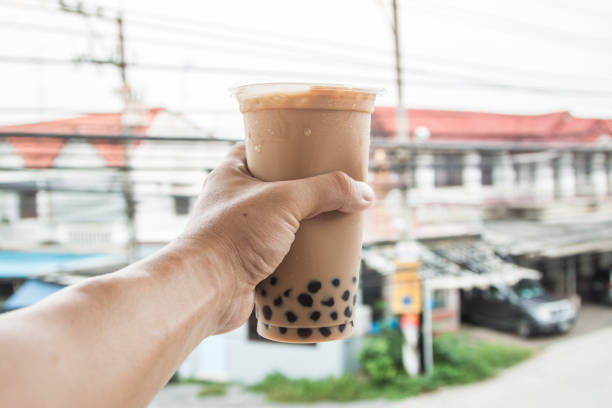 ice milk tea with boba bubble drinking in Thailand