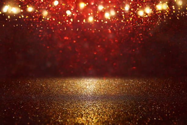 istock Red, black and gold glitter lights background. defocused. 1052896950