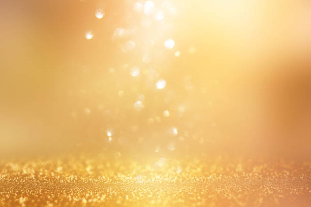 istock glitter vintage lights background. silver and gold. de-focused. 1052896986