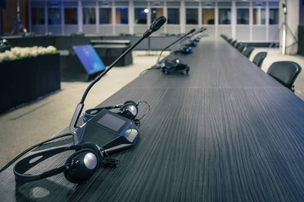 istock A row of microphone and headphone sets 1052897132