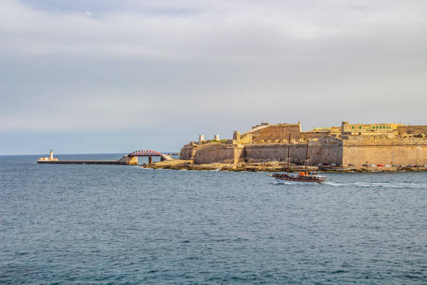 istock A cruise ship passes along Fort Saint Elmo at Grand Harbor, Malta 1052897650