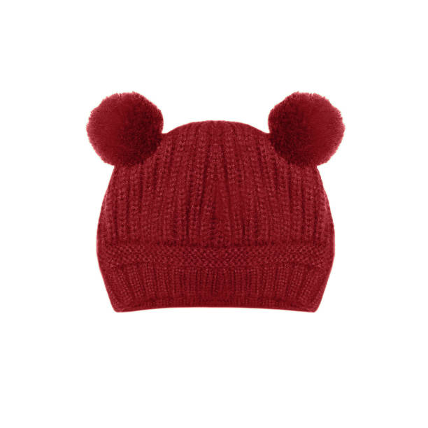 Red knitted baby hat with funny ears bear isolated on white background stock photo