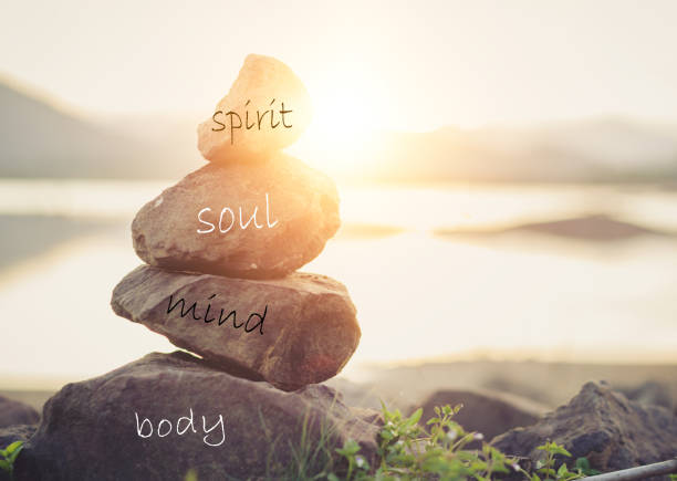Concept body, mind, soul, spirit Holistic health concept of zen stones / Concept body, mind, soul, spirit, spirituality stock pictures, royalty-free photos & images