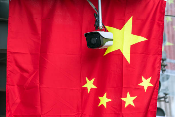 istock Smart surveillance cameras help automatically track identify almost every move in China. Machine Learning analytics face identify person technology , Artificial intelligence concept. 1052914360