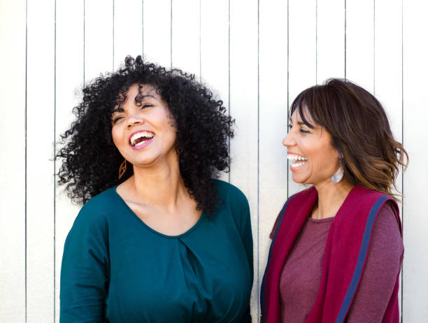 Two best friends laughing and having fun together