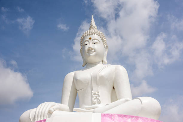 istock White Buddha and sky background Phra Buddha Rattanamanee Mahaborphit Chonlasit Mongkholchai 1052919840