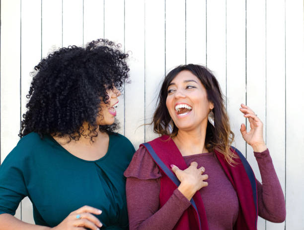 istock Two best friends laughing and having fun together 1052920100