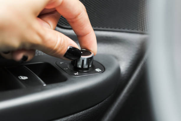 istock Control panel on the armrest of the car door 1052922220
