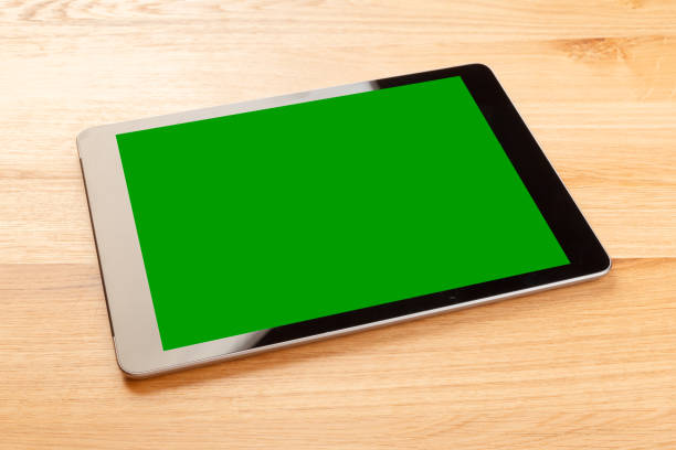 istock digital tablet on the wooden floor 1052929548