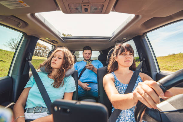 istock boring people in car. long road trip 1052936100