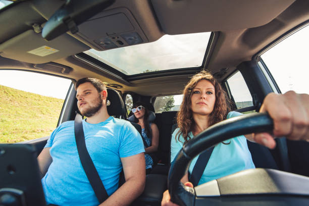 istock friends in car. road trip 1052936114