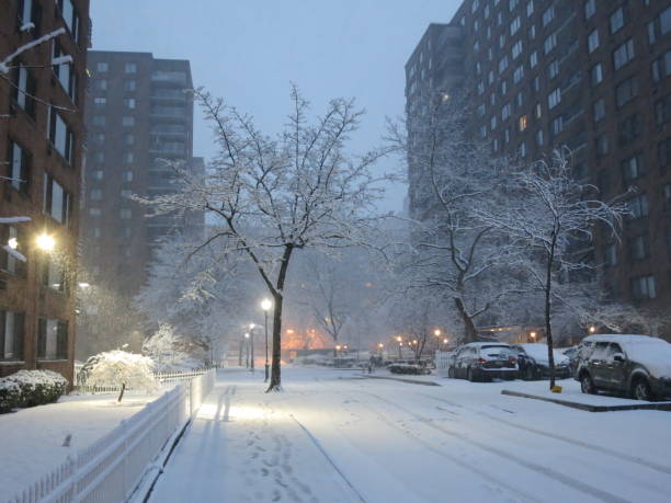 New York, USA - 04 01 2018: Manhattan New York City streets covered with snow blizzard during winter time.