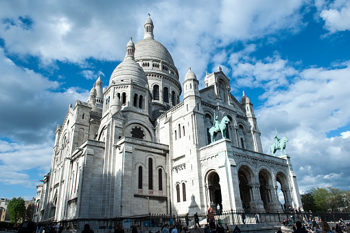 'Paris, France - JApril 24, 2018. Basilica Of The Coronation Heart with tourists'