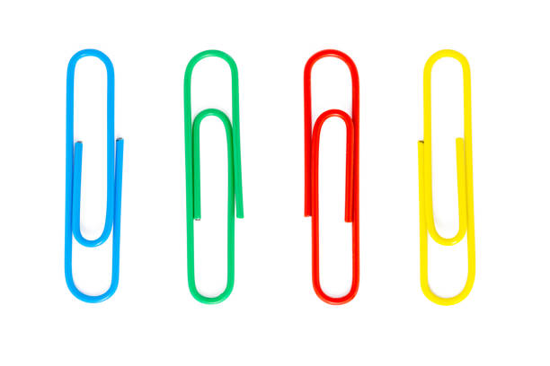 istock Colored paper clips close-up isolated on a white background, with clipping path 1052952290