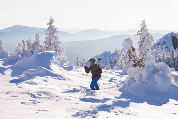 istock Man in the forest, winter day 1052966986