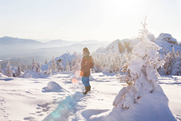 istock Man in the forest, winter day 1052967870