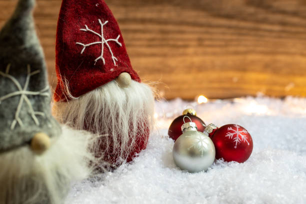 istock Two Santas with three Christmas balls 1052974136