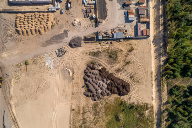 istock construction of a large industrial facility, aerial view 1052979070