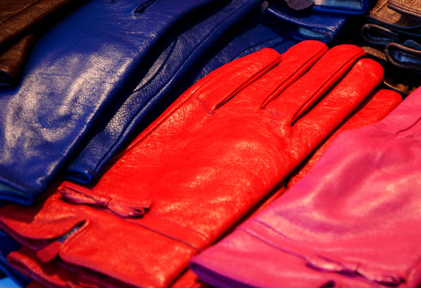 Colorful leather gloves background. Winter shopping.