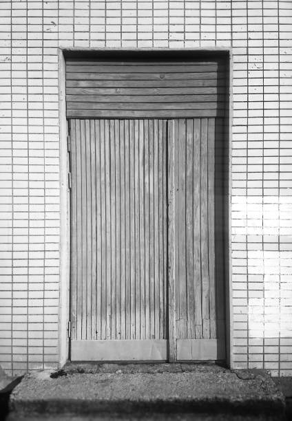 istock Vertical geometric closed door background 1052983560