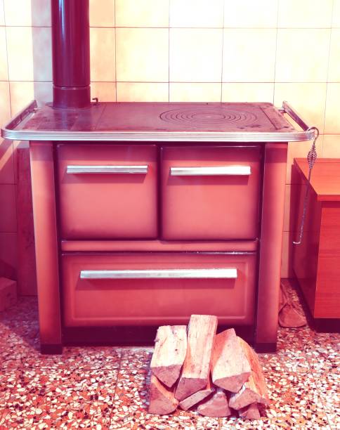 istock wood stove in a kitchenette with 70s antiqued effect 1052986002