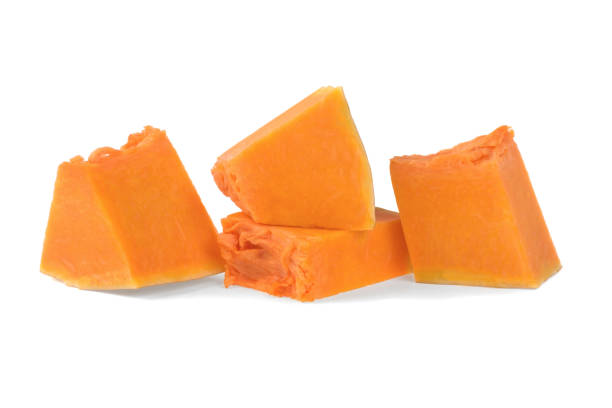istock pumpkin chopped slices isolated on white background 1052989422