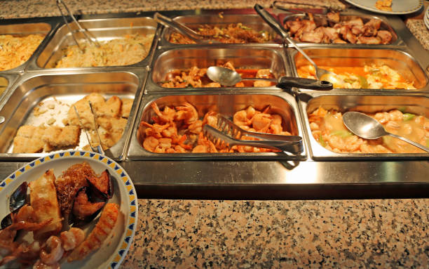 istock trays with fried food in a Chinese restaurant 1052990574