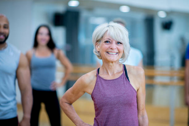 istock Smiling Woman In Gym 1052993980