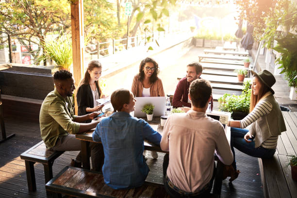 istock Turning their local cafe into their own boardroom 1052998196