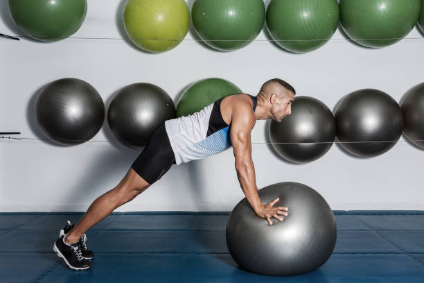 istock Strong man training with medicine ball 1052998516