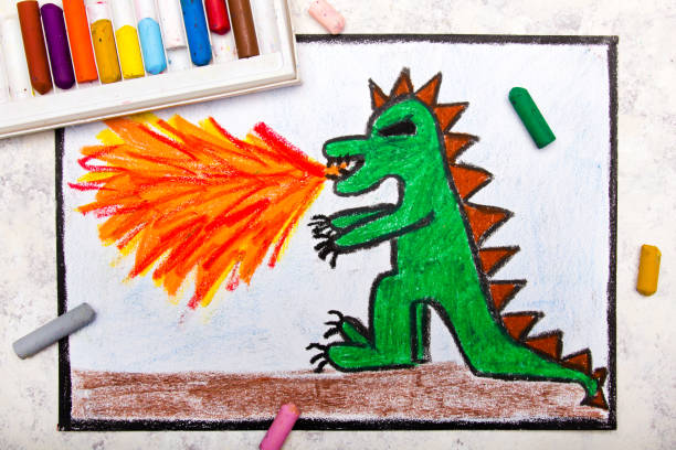 istock Colorful hand drawing: dragon spitting fire. Fire breathing dragon on paper. 1053000210