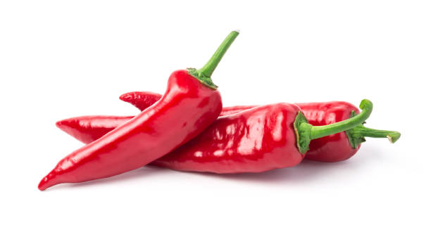 istock Red chili peppers isolated on white background. 1053004498