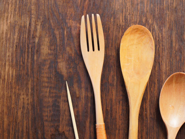 istock Wooden utensils on wooden cutting board 1053009372