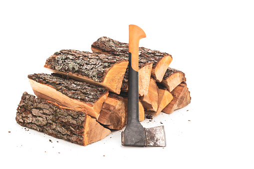 A stack of split firewood and axe on a white background