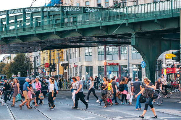 London, UK - October 5 2023: People walk across Millennium Bridge