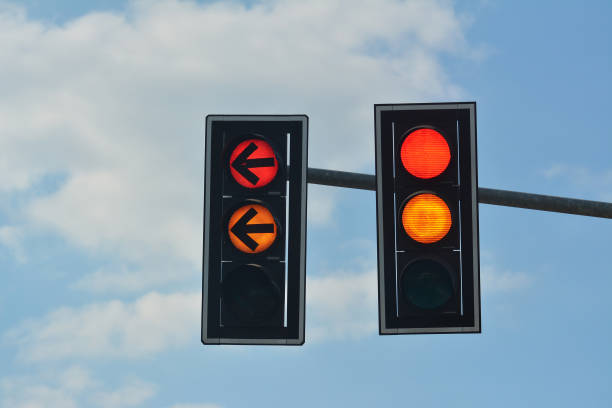 istock Red and yellow color on the traffic light 1053011778