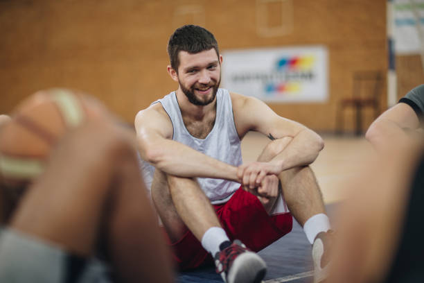 istock Happy basketball player taking a break on the court. 1053017700