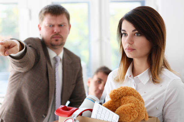 istock Angry yelling boss point arm to exit dismissing sad 1053018070