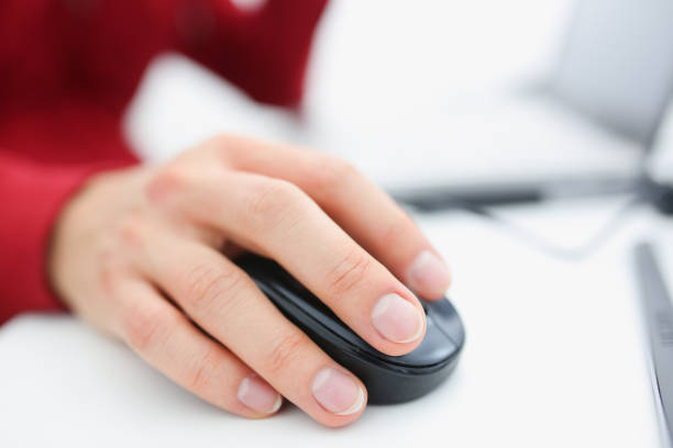 istock Male hand used computer mose holding in arm 1053018134