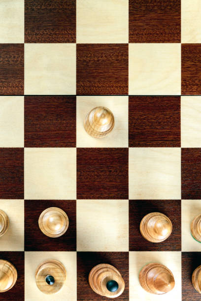 istock A pawn making the first move on a chessboard at the very beginning of the game 1053022052