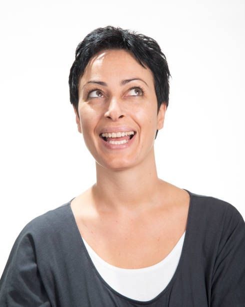 istock Beautiful woman isolated over a white background thinking on something 1053024684